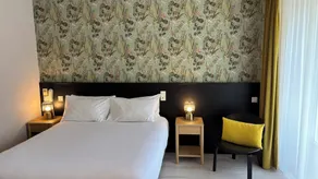 Logis Hôtel Restaurant Grand Hôtel de Lyon - Zimmer