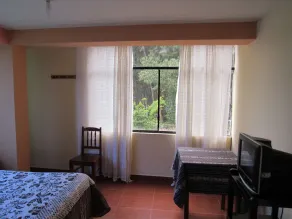 Hostal Ayllu con cochera - Room