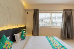 Treebo Sanmaya Retreat, 15 Mins From Mysore Palace - Chambre