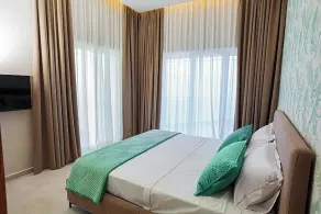 Toto Hotel & Apartments - Chambre