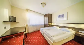 PLAZA INN Rieker Stuttgart Hauptbahnhof - Chambre
