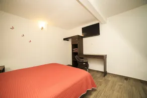 Capital O Hotel Boutique Las Torres - Camera