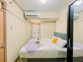 Best Strategic 2BR Apartment at Green Palm Residence By Travelio - Zimmer