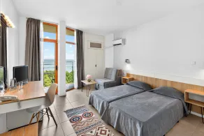 Sunrise Hotel - Værelse