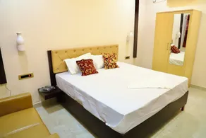 Gokulam Grand - Chambre