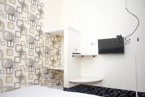 Capital O 2258 Santana Syariah Guest House - Room