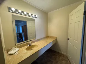 Country Inn & Suite - Badezimmer