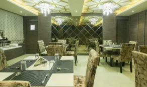 Treebo Hoops - Airport, VIP Road - Restaurant