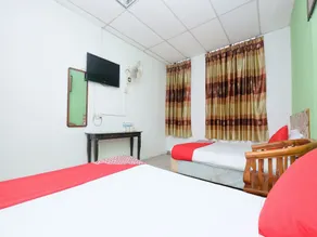 OYO 850 Gold Star Hotel - Chambre