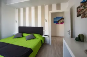 Sunset Rooms - Quarto