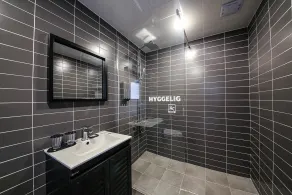 Hotel Hyggelig - Badezimmer