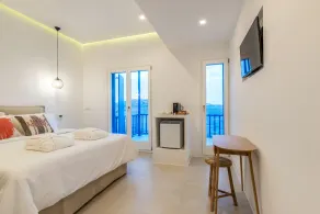 Bluetopia Suites - Chambre