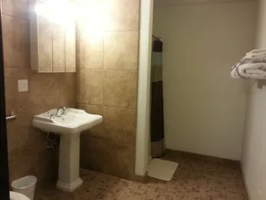 The Oasis Extended Stay - Badezimmer