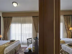 Arabian Dreams Deluxe Hotel Apartments - Chambre
