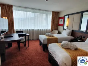 Nash Suites Airport Hotel - Chambre