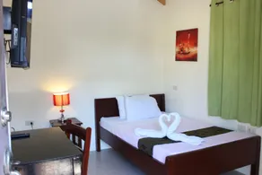 Blue Lagoon Inn & Suites - Room