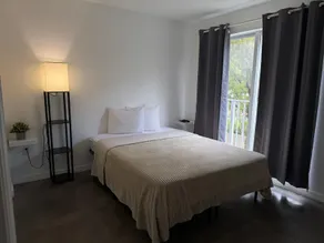 Triangle Suites LLC - Værelse