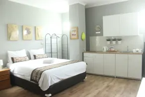 Manggolo Homestay Syariah - Zimmer