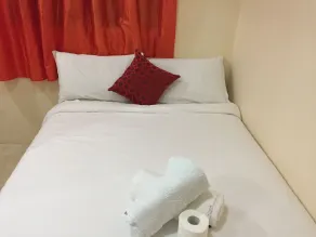 La Gracia Apartelle - Chambre