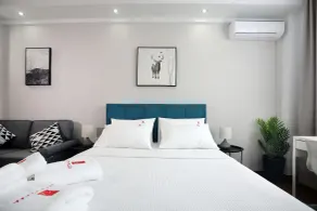 City Plaza Apartments & Rooms - Chambre
