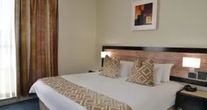 The Parktonian All Suite Hotel - Room