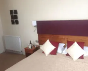 The George Hotel - Værelse