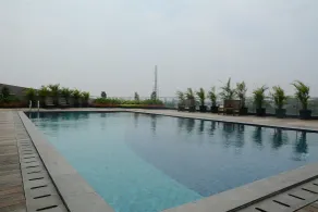 Cozy Stay Studio at Tree Park City BSD Apartment By Travelio - Pool
