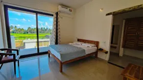 Hampi Delmont Resort - Zimmer