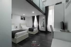 Arch Rome Suites - Chambre