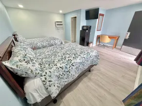 Deluxe Inn - Værelse