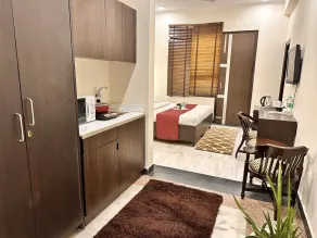 Hollyhocks Residency - Room