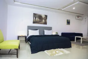 Tris Estates Hotel & Suites  - Værelse