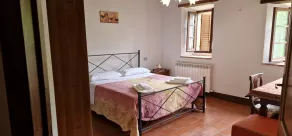 View of Monte Amiata for 3 guests Agriturismo La Piaggia - Vivo dOrcia - Værelse