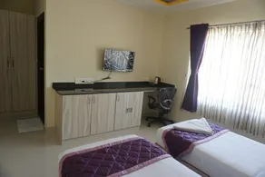Zenith Suites - Quarto