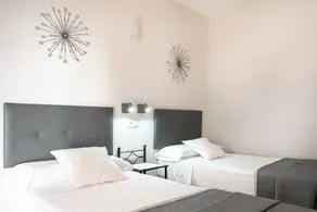 Hostal Cuevas - Chambre