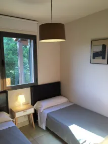 \"Casa en la playa con piscina y port Aventura\" avec piscine partagée, climatisation et Wi-F - Chambre