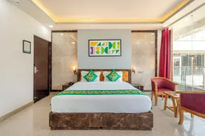 Treebo Arya Palace With Swimming Pool - Chambre