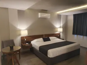 Estanza Hotel & Suites - Chambre