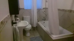 Magaliqua Guest House - Badezimmer