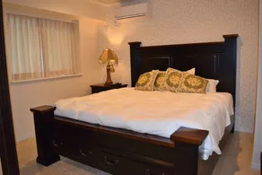 Wisteria Condominium Resort - Chambre