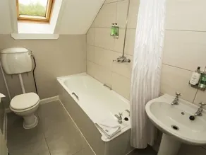 Village Inn - Baño