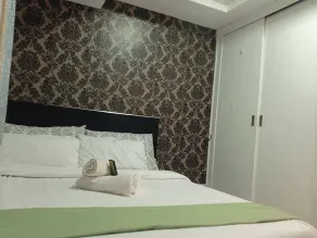 Grand Riviera Suites Comfy Condo near US Embassy Manila Bay Roxas Blvd Ermita Manila - Værelse