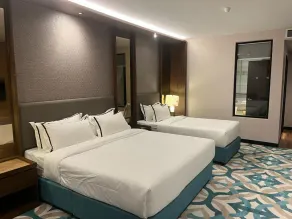 CHRISTEE SUITES HOTEL - Chambre