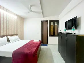 Roomshala 171 JP House - Chambre