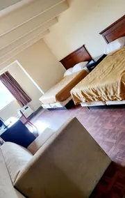 Metro Inn & Suites - Room