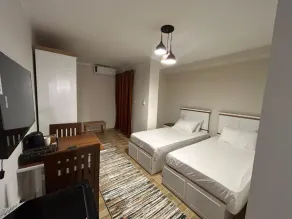 Skyline luxury hotel apartments 5 mins from Cairo Airport - Værelse