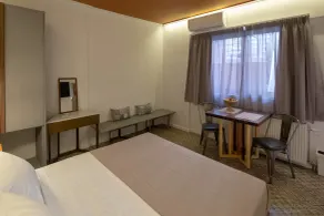 ATHENIAN YARD SUITES - Room