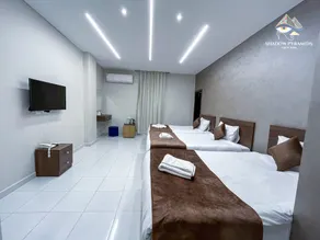 Shadow Pyramids INN - Habitación