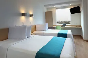 One Leon Poliforum - Chambre