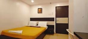 RR Grand Inn - Chambre